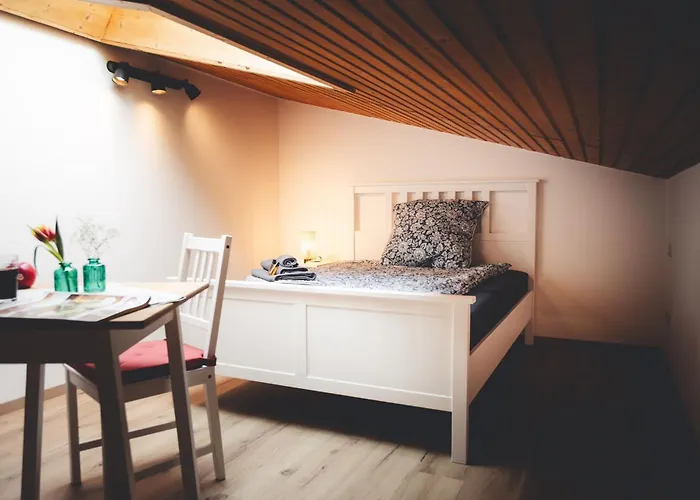 Quarto em Acomodações Particulares Kinsau Rooms